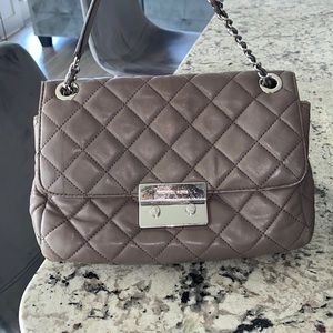 Michael Kora cross body mauve purse
